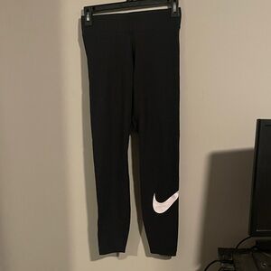 NWOT black Nike leggings with white swoosh on leg
